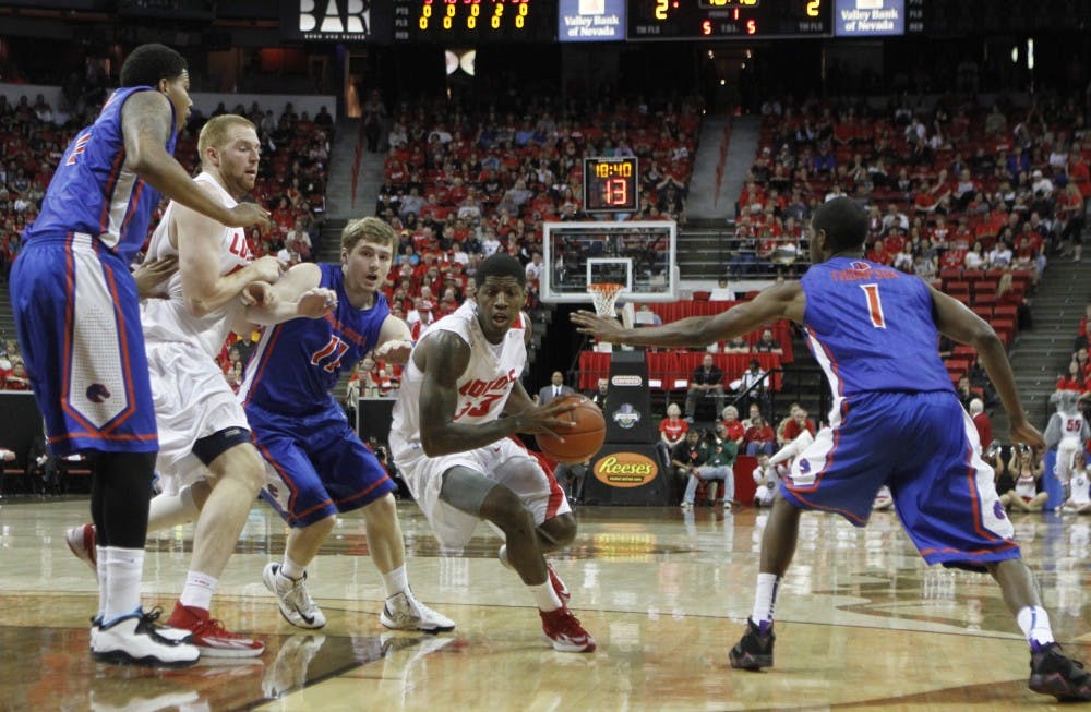 	New Mexico guard Deshawn Delaney drives through the Boise State defense Thursday night at the Thomas &amp; Mack Center. The Lobos won 70-67 and will face San Diego State for the Mountain West tournament title on Sunday at 4 p.m. MT. 