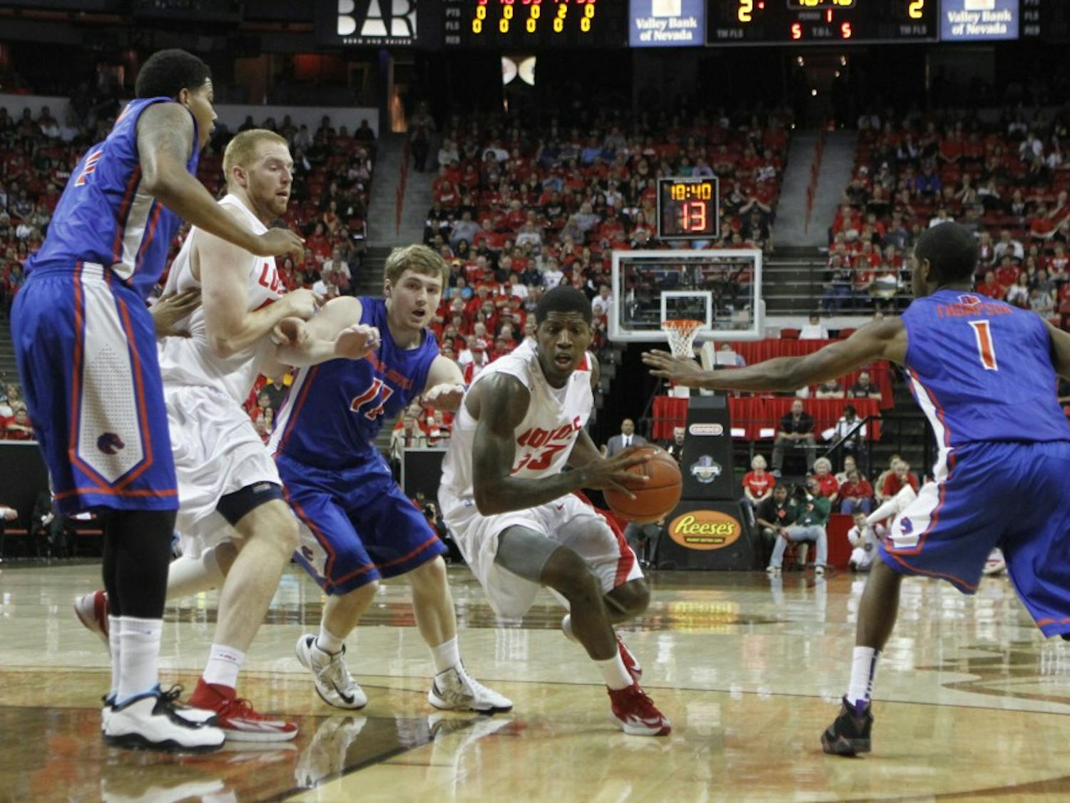 New Mexico guard Deshawn Delaney drives through the Boise State defense Thursday night at the Thomas & Mack Center. The Lobos won 70-67 and will face San Diego State for the Mountain West tournament title on Sunday at 4 p.m. MT.