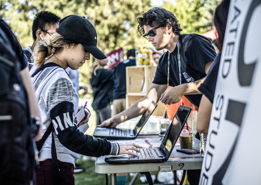 Aurora Martinez takes the ASUNM “It's On Us" pledge near the UNM Duck Pond, Tuesday, Sept. 19, 2017. “It's On Us” is a nationwide campaign to end sexual assault.