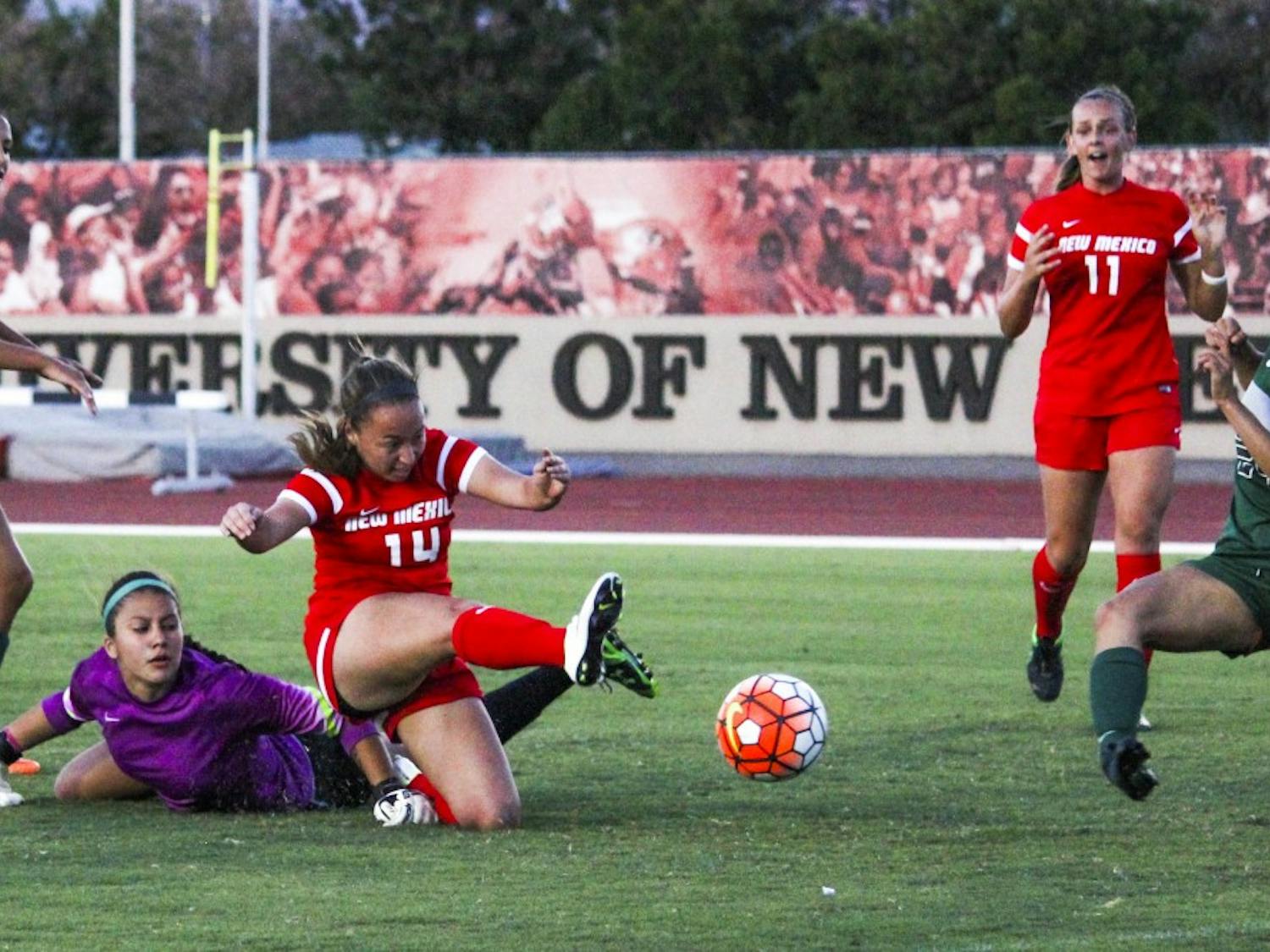 Junior midfielder Claire Lynch fires a shot over a Eastern New Mexico goal keeper Sunday August 14, 2016 at the UNM Soccer Complex. The Lobos tied Weber State 0-0 and will play Idaho State Sunday September 4, 2016.