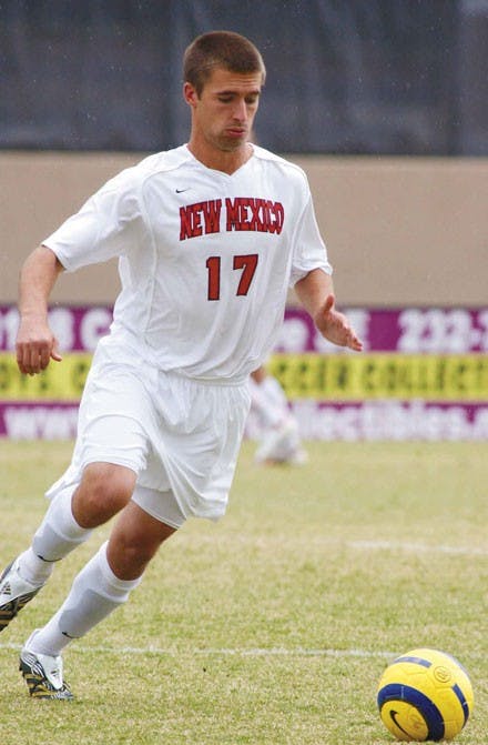 Lobo sophomore Mike Porter dribbles downfield during a game at the UNM Soccer Complex.
