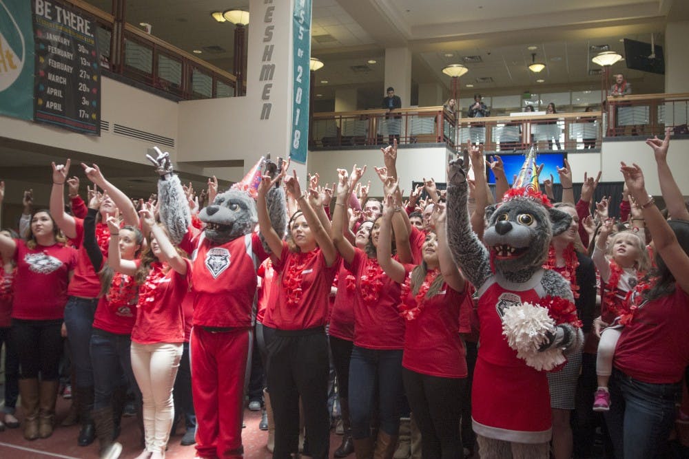 Around 200 students wearing cherry and silver participated in the annual student body photo that will hang in the SUB for a full year. UNM celebrates its 126th birthday this year.

