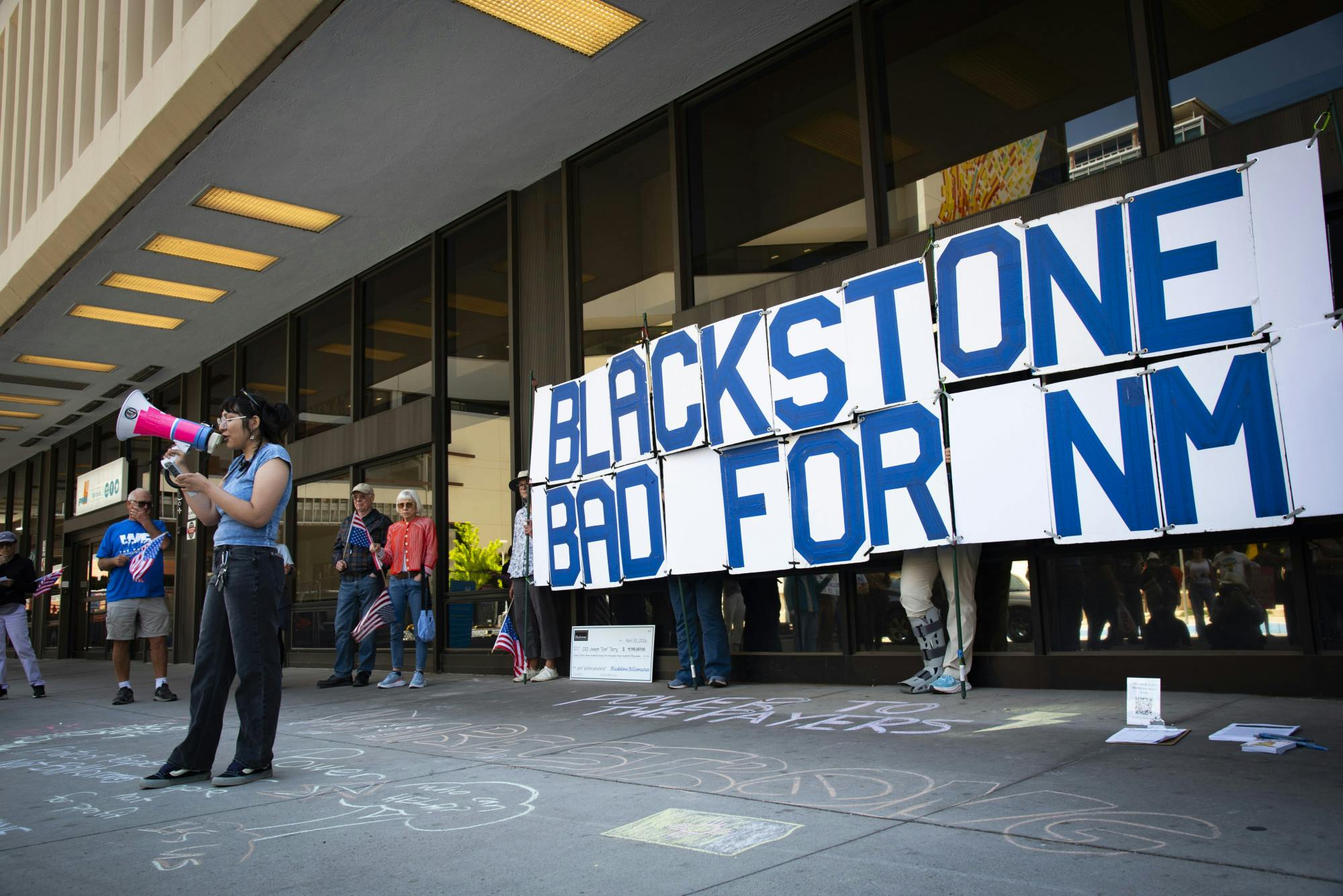 PHOTOSTORY: Protesters call on PNM to ‘change their mind’ on Blackstone deal 