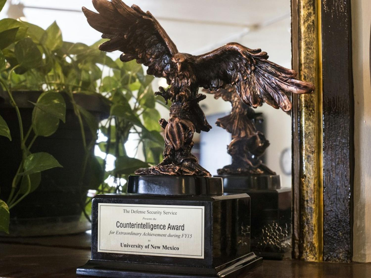 A counterintelligence award sits in Deborah Kuidis’ office Friday afternoon. The award was given to a team which Kuidis led that trained UNM staff and faculty on counterintelligence techniques.