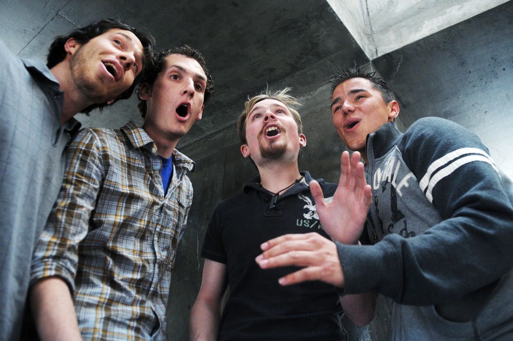	Members of 505 Chorus from left: Jesse Herrera, Tony Zancanella, Michael Stokes, and Tyler Jones, sing at the Center of the Universe on Monday. 