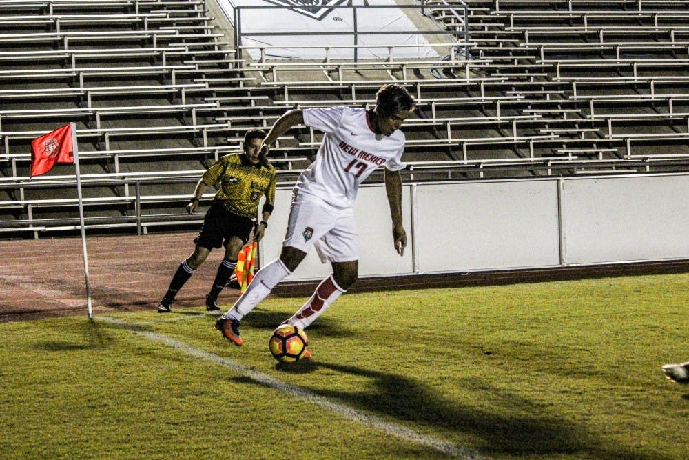 Freshman Forward, Alex Vedamanikam, guards the ball against a Grand Canyon University player on Aug. 19, 2017 at the UNM Soccer Complex. Vedamanikam was one of the two players at the exhibition match to score a goal securing UNM's win against GCU 2-0. 