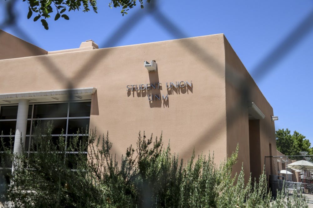As construction gets underway the outside of the Student Union Building gets fenced off on July 1, 2018.&nbsp;