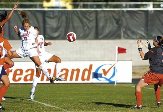 Lobo defender Alanna Abeyta scores on a header off a free kick in the second half, contributing the third goal during the Lobos' 4-0 win against UTEP at the UNM Soccer Complex on Sunday.