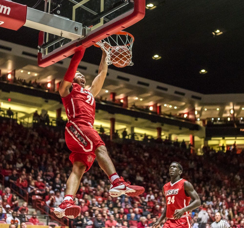 Xaiver Adams slams down a breakaway dunk against the Idaho State Bengals on November 11, 2016 at the Pit.