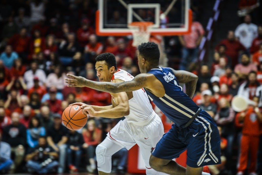 Redshirt junior guard Elijah Brown sprints past a Nevada University player Saturday, Jan. 7, 2016 at WisePies Arena.&nbsp;