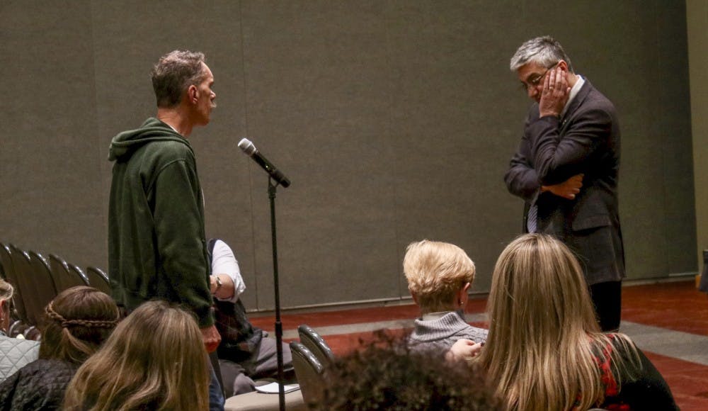 Acting University&nbsp;President Chaouki Abdallah listens to speakers during a town hall meeting on&nbsp;Monday, Feb. 13, 2017 at the UNM SUB.&nbsp;