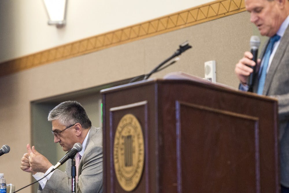 UNM Regents and President Bob Frank reached a settlement on Tuesday that ends Frank's tenure at the end of the month, in light of a recent external report and ensuing internal investigation.&nbsp;University Provost Chaouki Abdullah (left) will take over Frank's position in the interim beginning Jan. 1.