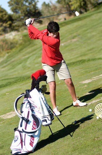 Morgan Grantham tees off at practice on Thursday. Grantham and the Lobos will travel to Hawaii for the Kent Youel Invitational on Oct. 28-29. 
