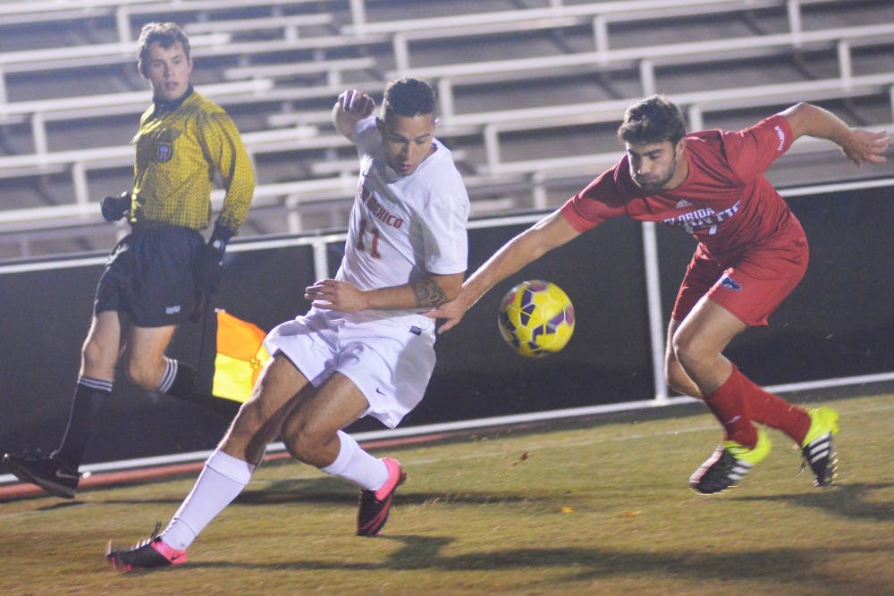 Junior forward Niko Hansen fights for the ball against a Florida Atlantic player at the UNM Soccer Complex Friday Nov. 6.&nbsp;The Lobos play the Gamecocks this Wednesday at the Conference USA Championships.&nbsp;