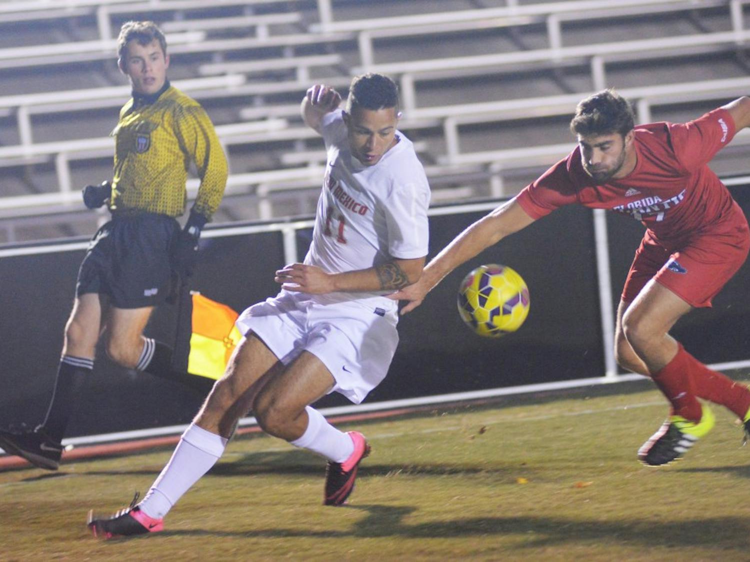 Junior forward Niko Hansen fights for the ball against a Florida Atlantic player at the UNM Soccer Complex Friday Nov. 6.&nbsp;The Lobos play the Gamecocks this Wednesday at the Conference USA Championships.&nbsp;
