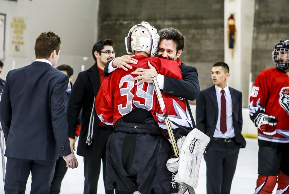 UNM head hockey coach Grant Harvey embraces goalie James Bostian after the overtime win against Colorado Mesa University, 5-4. The UNM hockey team will play at home against University of Colorado Colorado Springs on Friday, Oct. 20 and Saturday, Oct. 21. 
