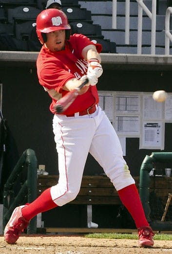 Max Willett takes a swing during Sunday's 10-8 win at Isotopes Stadium. 