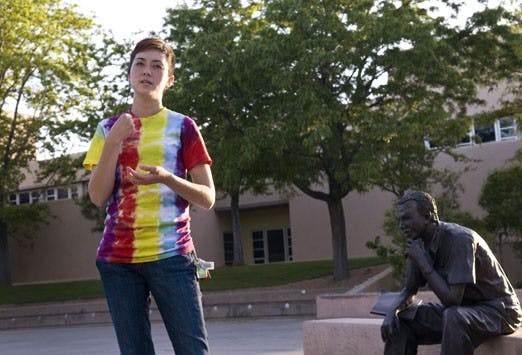                       Queer Straight Alliance co-chairwoman Brandy Rodke rehearses "Diversity Within" in front of the bronze statues near the SUB on Sunday. The play will be performed Wednesday and Thursday from noon-1 p.m.