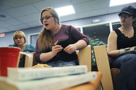 President of the Hobbit Society, Megan Abrahamson, speaks during a meeting in the Honors Forum on Tuesday.