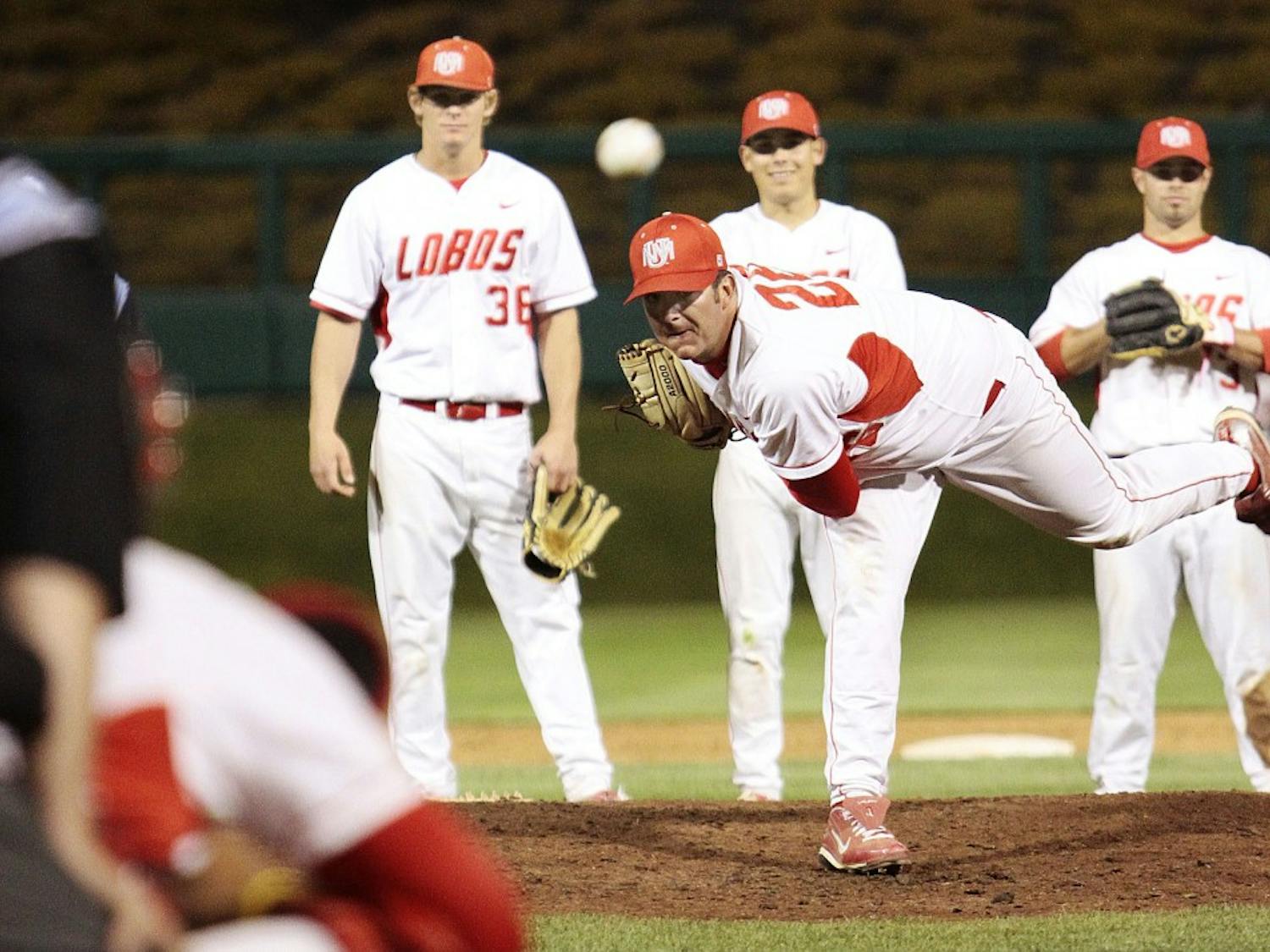 Left-handed pitcher Jason Oatman unfurls a pitch during Thursday’s game against BYU at Isotopes Park. The Lobos won 11-5.