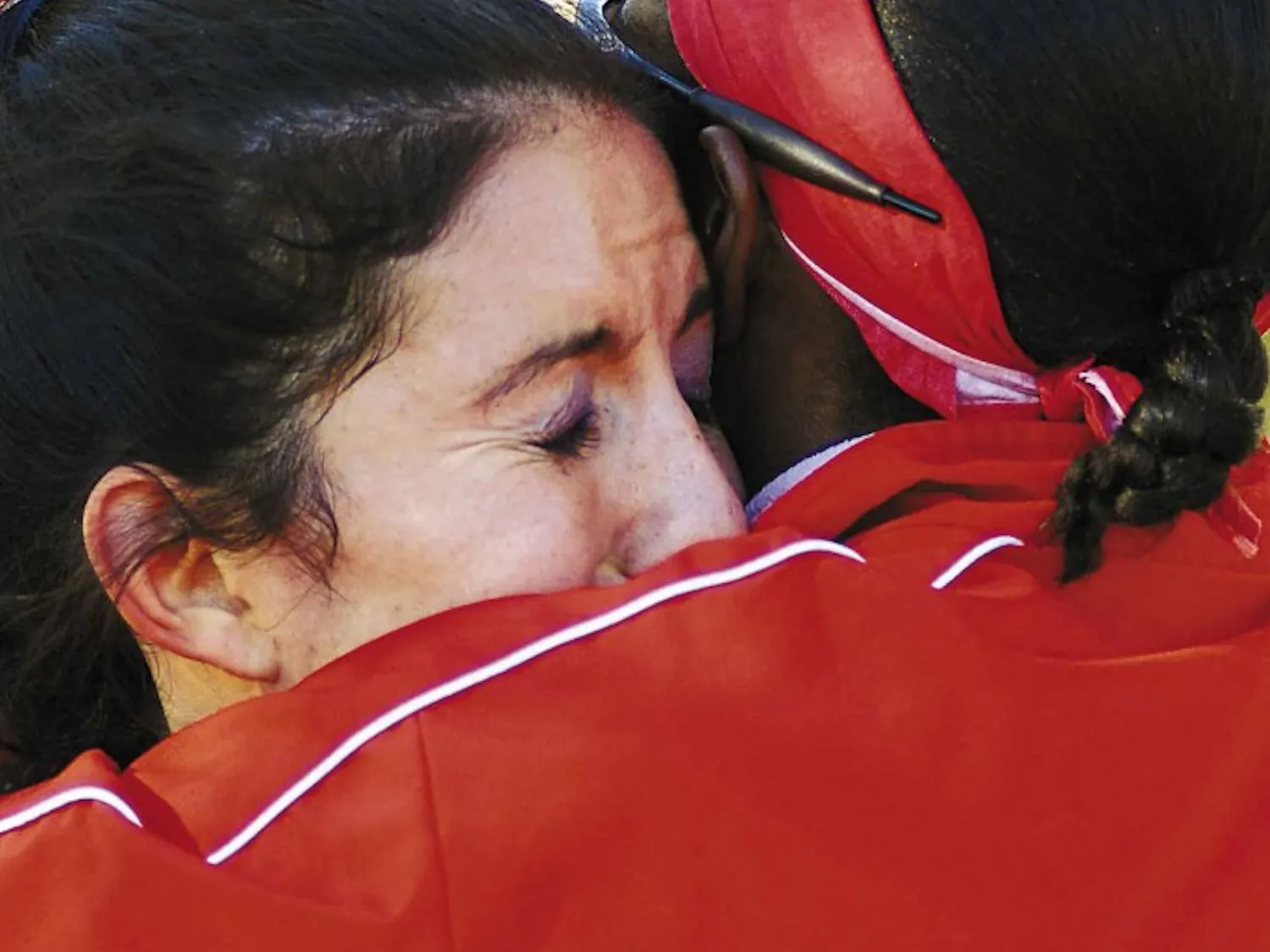 UNM cross country runner Leslie Luna cries after finishing 18th during the NCAA Mountain Regional at the UNM North Golf Course on Saturday.