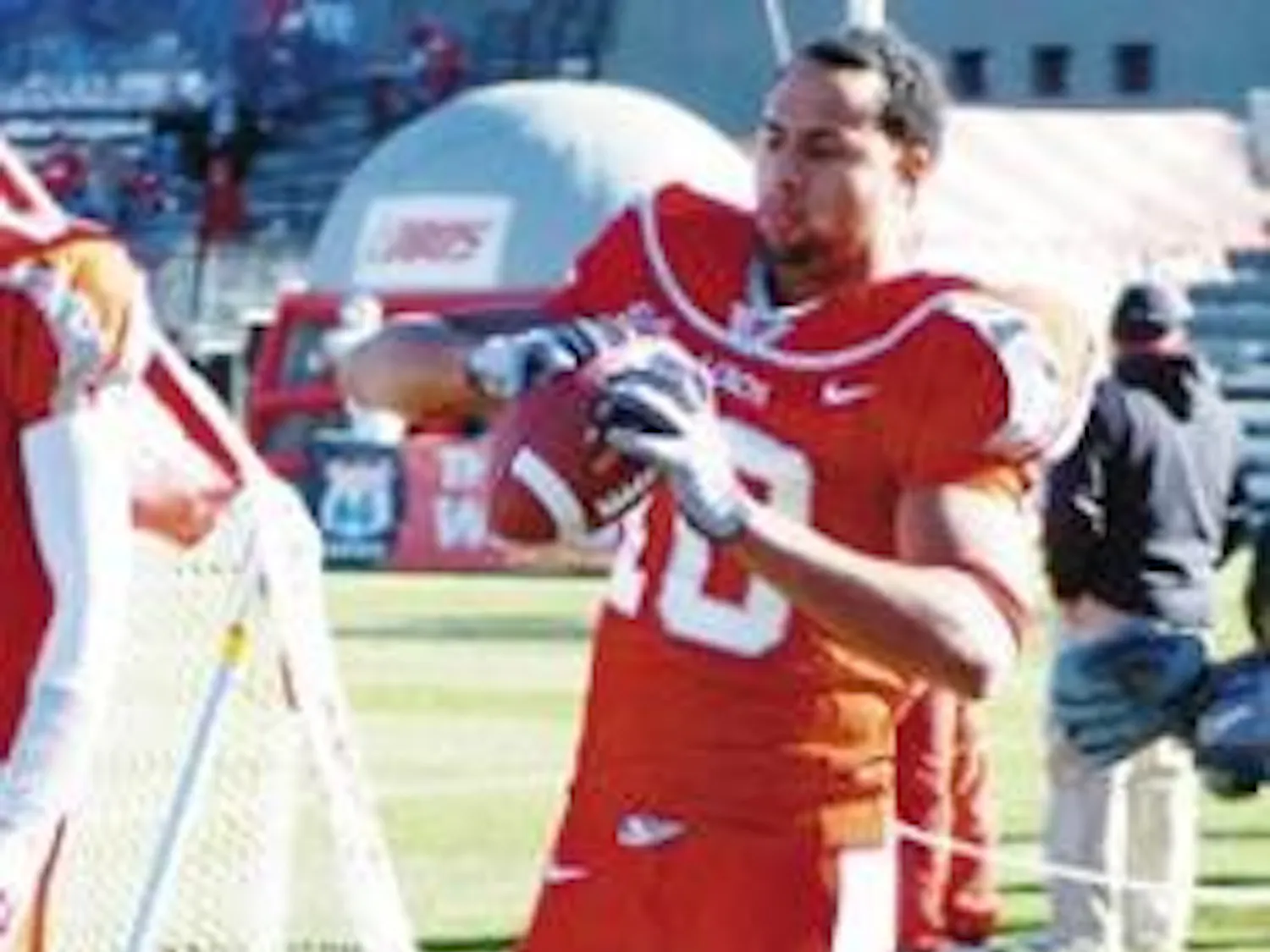 Former Lobo wide receiver Hank Baskett warms-up on the sidelines during the Nov. 19 game against Air Force at University Stadium.