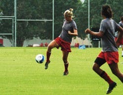 UNM forward Kristine Sweat gets ready to control a pass in a scrimmage during practice Tuesday at Robertson Field. 