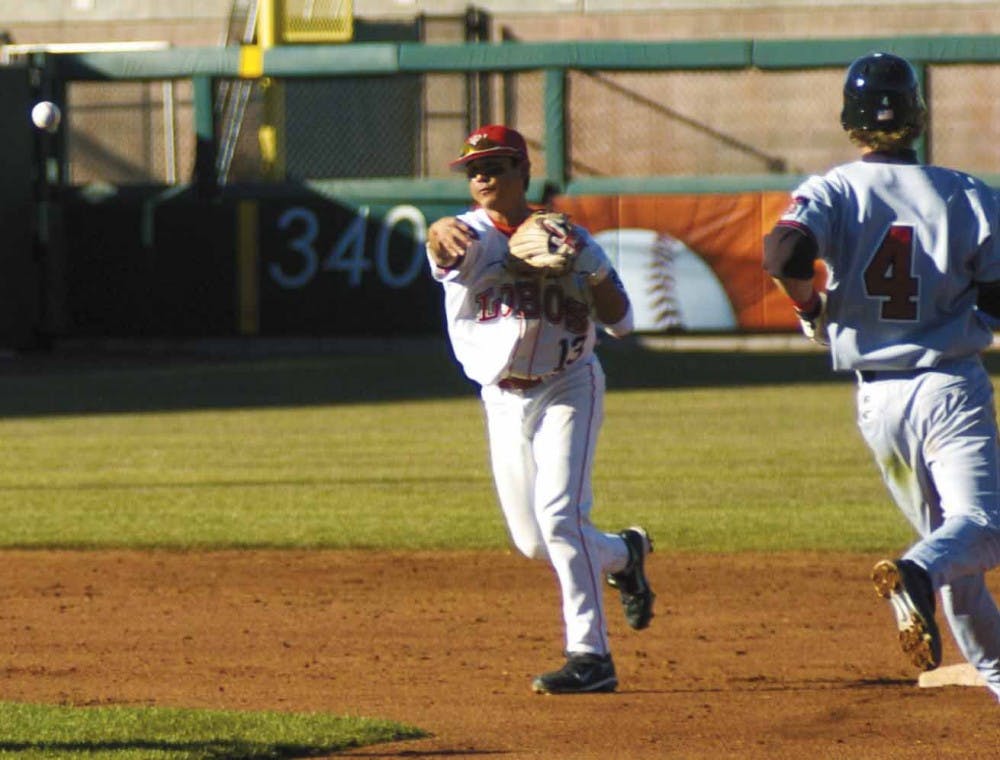 Second baseman Chad Itokazu throws to first base to complete a double play in the third inning of Tuesday's 10-8 loss to Texas Tech at Isotopes Park.