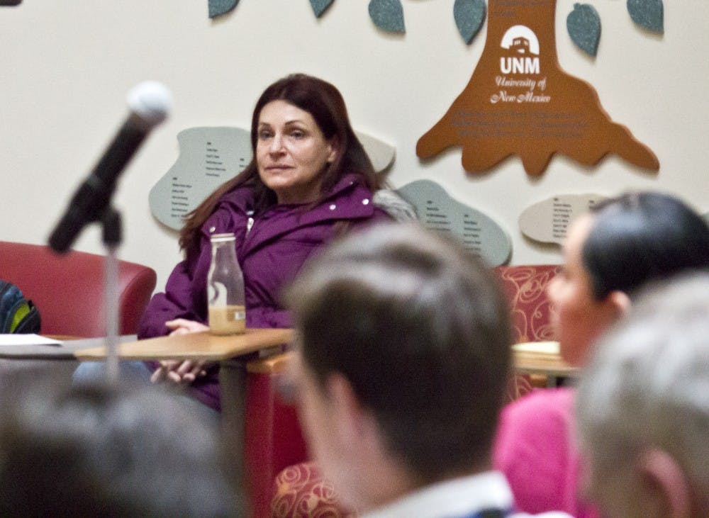 	Psychology major Sheryl Brooks looks on as members of the public addressed UNM staff members at the public safety forum Friday. The forum was in response to two recent sexual assault incidents on campus. Brooks asked the panel why no UNMPD representatives were present at the forum and how the University would prevent further attacks.