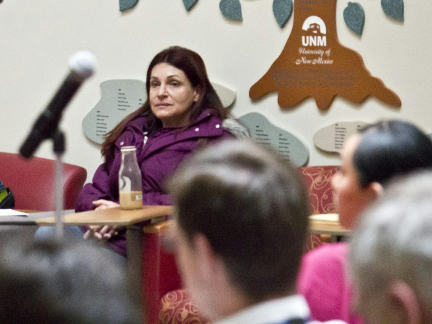 Psychology major Sheryl Brooks looks on as members of the public addressed UNM staff members at the public safety forum Friday. The forum was in response to two recent sexual assault incidents on campus. Brooks asked the panel why no UNMPD representatives were present at the forum and how the University would prevent further attacks.