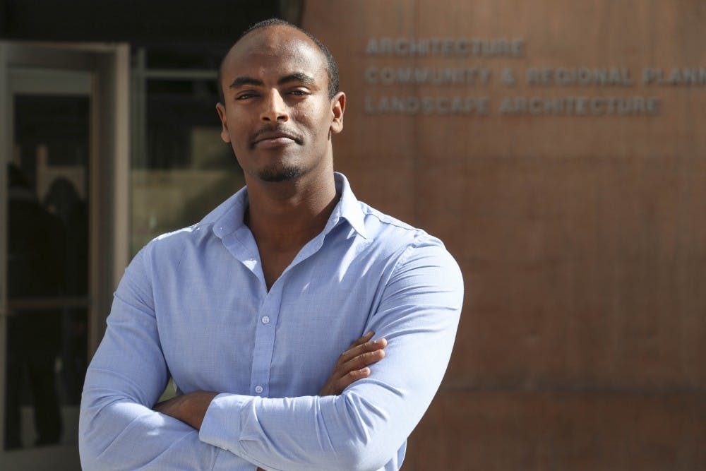 Sam Fantaye stands confident in front of the UNM architecture building on the afternoon of Jan. 30, 2018. 