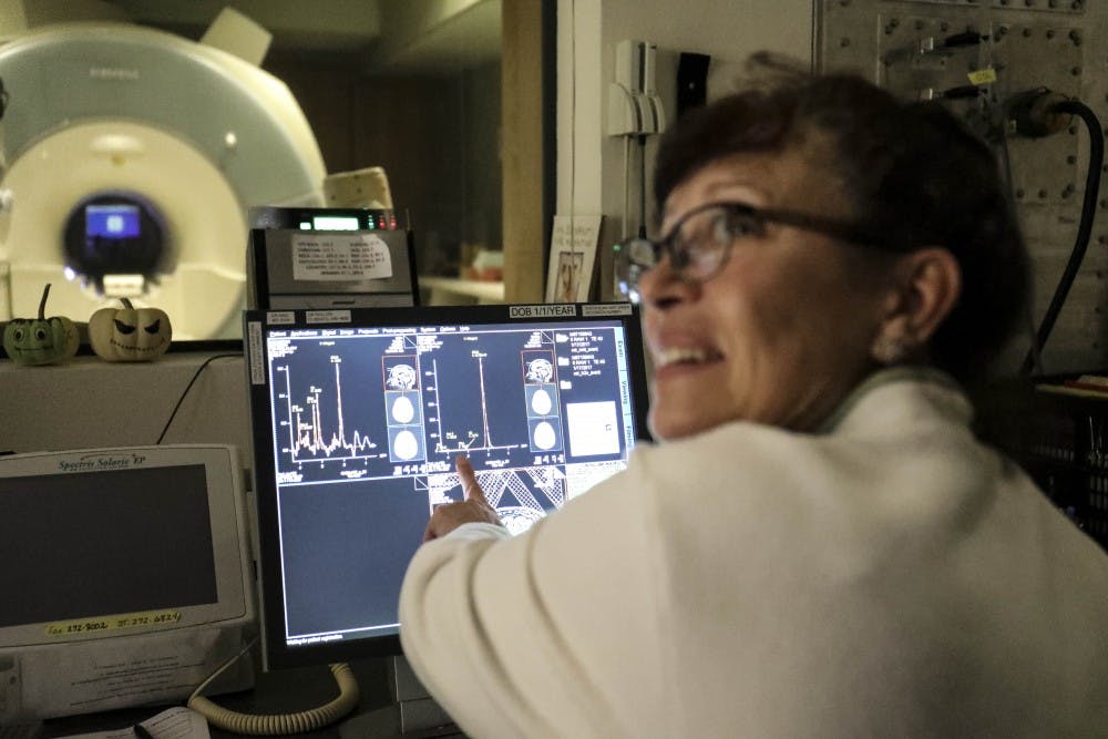 MRI manager of the Pete and Nancy Domenici Center, Diana Smith, Shows reporters brain activities and MRI scans on Dec. 06, 2017.  