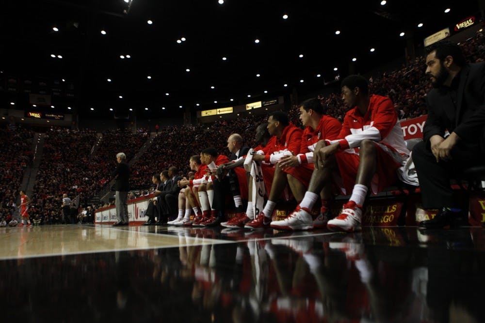 SAN DIEGO, CA- MARCH 8: The Lobos watch from the bench as their lead on The San Diego State Aztecs becomes tighter during the game Saturday night in San Diego. SDSU won their Mountain West-Leading eight conference title against the New Mexico Lobos 51-48.   (Photo by Aaron Sweet/Daily Lobo) 