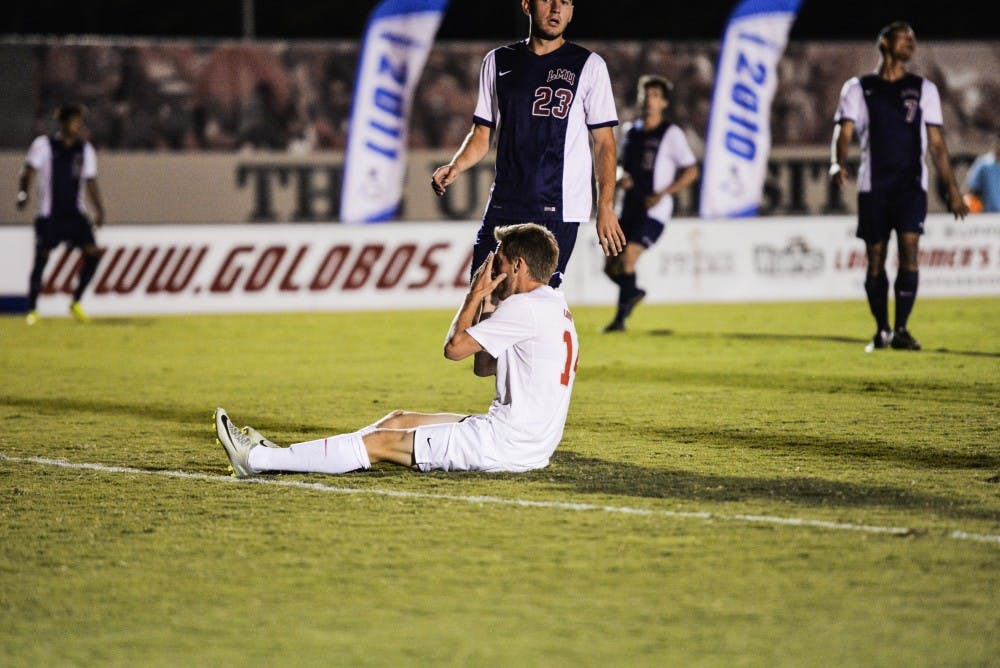 Redshirt senior Chris Wehan puts his hands up after missing a shot against LMU on Tuesday, Oct. 4, 2016 at University Stadium. The Lobos lost their match 2-1 against FAU on Saturday, Oct. 15, 2016.