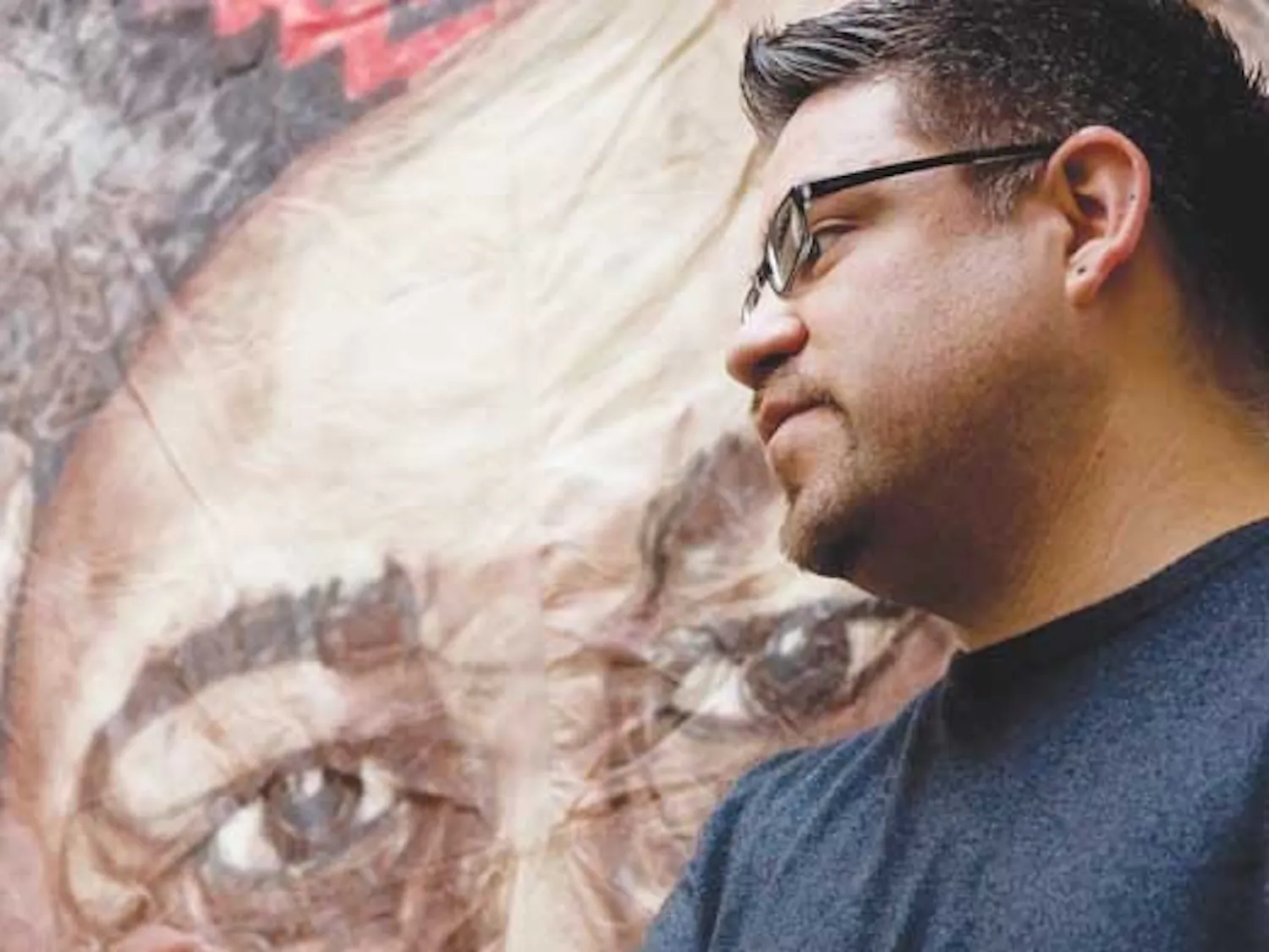 GPSA President Christopher Ramirez speaks in the SUB on Tuesday during a celebration of Cesar Chavez's 82nd birthday. The event was hosted by Raza Graduate Student Association, El Centro de la Raza, GPSA and Movimiento Estudiantil Chicana/o de Aztlan. Par