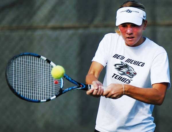 UNM's Sandra Zmack hits a back hand during practice Tuesday at the UNM Tennis Complex. ------