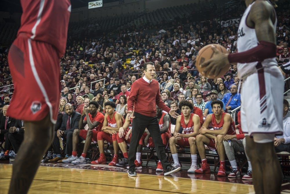 Paul Weir reacts during the UNM Lobo vs. NMSU Aggie game. The Lobos lost 65-100