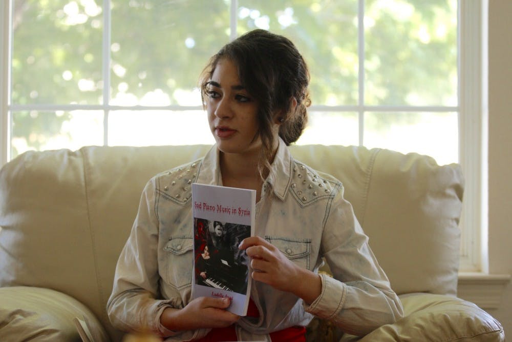 Ludella Awad holds her published book on August 1, 2016. Awad, who is 16-years-old has already published three other books.&nbsp;