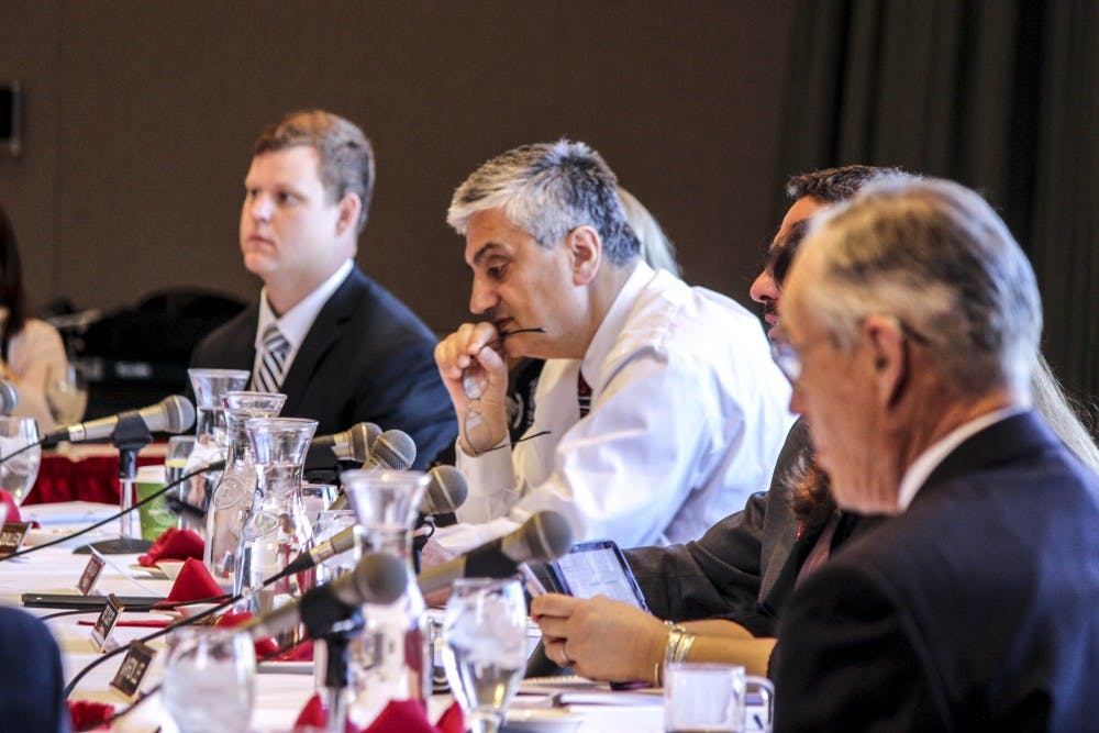UNM interim President Chaouki Abdallah reviews the agenda during a Board of Regents meeting on June 13, 2017. 


