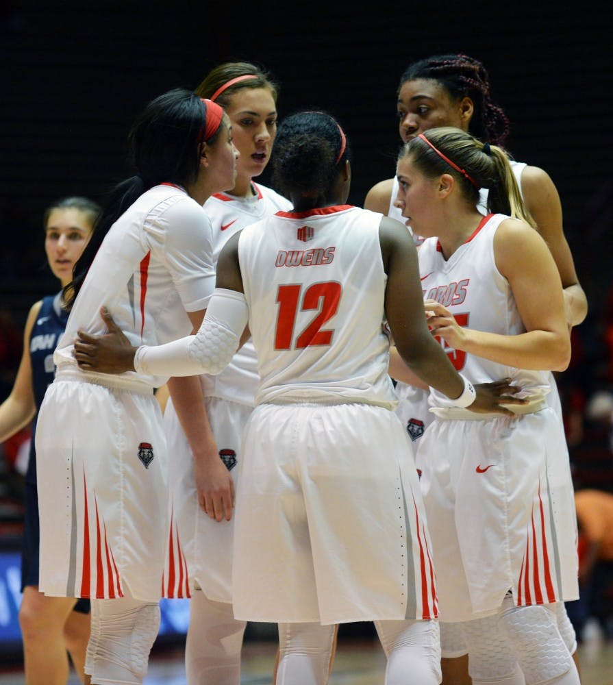 The Lobos huddle together before a free throw Wednesday night at WisePies Arena. The Lobos will play&nbsp;Boise State this Wednesday at 7 p.m. in Boise, Idaho.&nbsp;