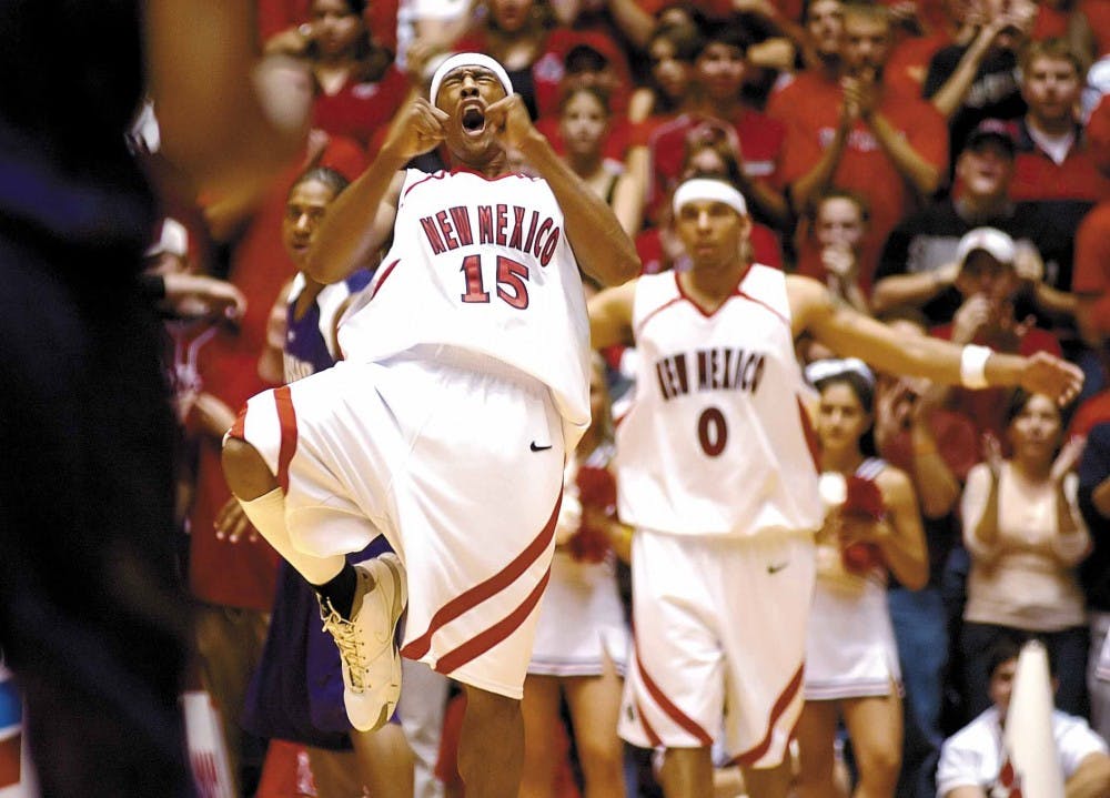 Lobo guard J.R. Giddens celebrates a teammate's basket during Tuesday's 78-54 win over Kansas State at The Pit.