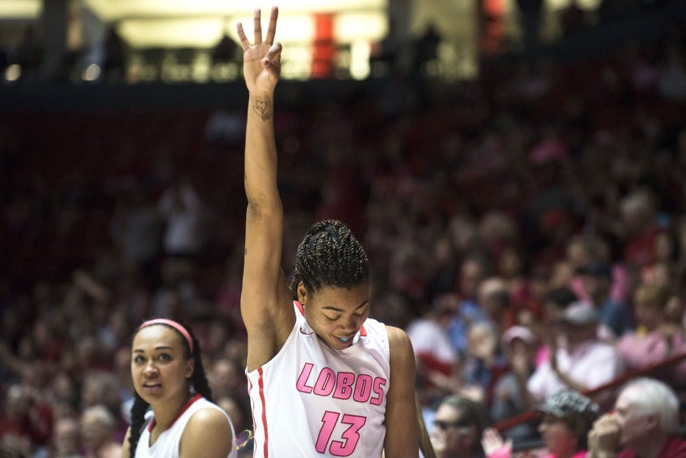New Mexico forward Khadijah Shumpert celebrates a 3-pointer during Saturdays game against Nevada at WisePies Arena. The Lobos have earned their 10th straight home win.