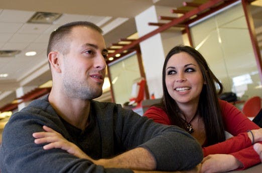 John Melia and Amy Perea talk in the SUB on Thursday. The couple are finalists in a contest that would pay for their wedding.