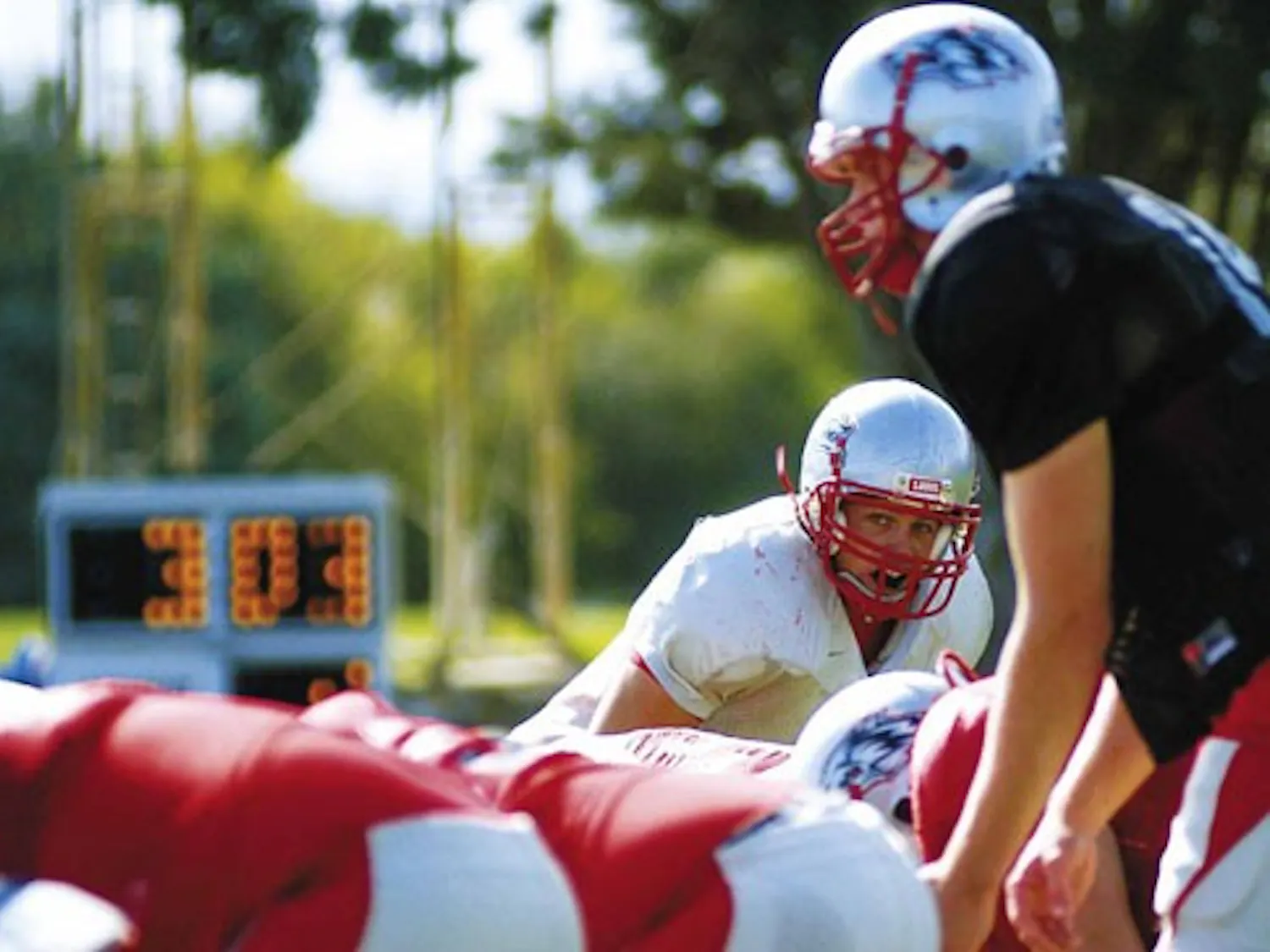 Linebacker Cody Kase looks over the offense during a team scrimmage at the Lobo football practice field Wednesday.