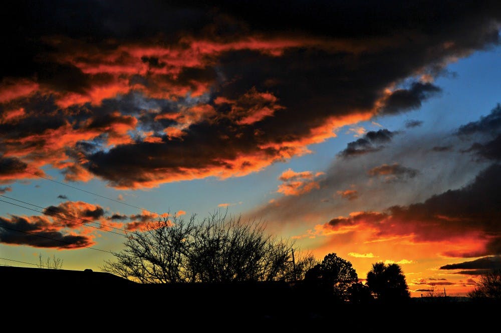 A New Mexico sunset graces the sky near the Heights area on a November 15, 2014. New Mexico is known for its breathtaking sunsets.