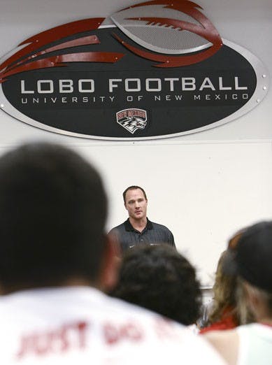 Assistant athletic trainer David Smith speaks to a group of women attending the "Football 101" Women's Clinic on Saturday at University Stadium.