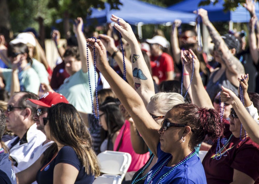 Albuquerque citizens participate in a fundraiser walk, helping 'American Foundation for Suicide Prevention' increase awareness and research September 29, 2018 at Hoffmantown Church.