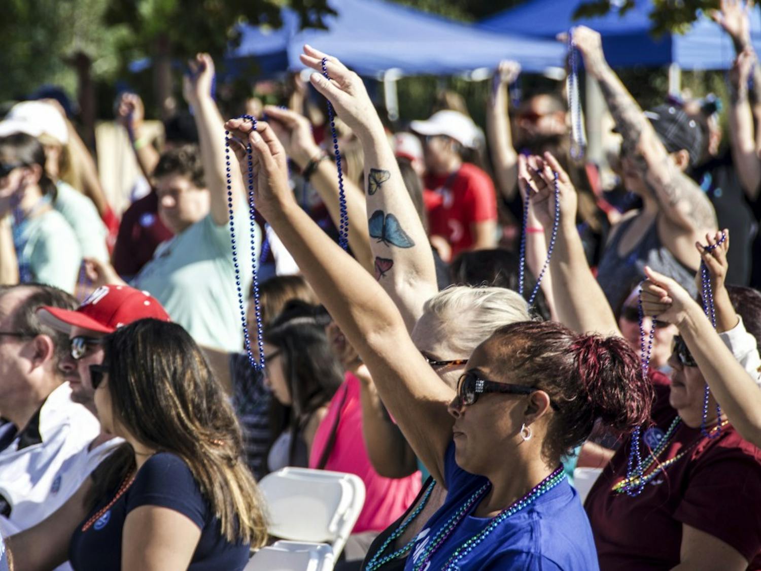 Albuquerque citizens participate in a fundraiser walk, helping 'American Foundation for Suicide Prevention' increase awareness and research September 29, 2018 at Hoffmantown Church.
