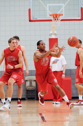 Dairese Gary catches a pass at practice Wednesday. UNM tips off the season at home against Southeast Missouri State tonight at 7:05 p.m. 