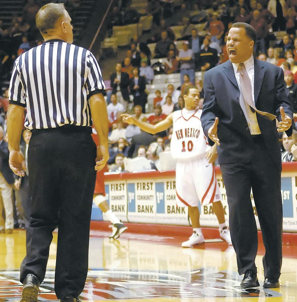 Head coach Ritchie McKay yells at official Chris Rastatter during the second half of Tuesday's game against San Diego State at The Pit. The Lobos lost 81-74 in overtime. 